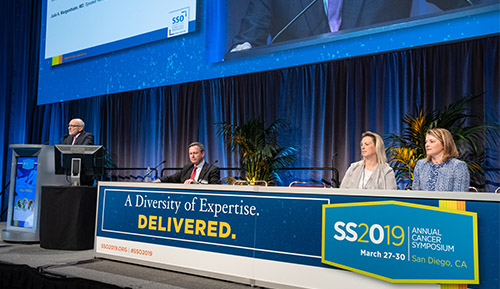 Dr. Bartlett at the table onstage at the 2019 SSO conference